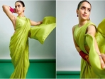 Sanya Malhotra is a total stunner who can pull off any look to perfection. Whether it's a sartorial saree or a casual dress, the stunning actress makes sure to turn heads with her incredible style. Her Insta-diries full of stylish looks are a treasure trove of fashion inspiration for all her followers. Her latest look in a lime green saree is no exception and is sure to inspire your festive wardrobe. Scroll down to take a few style notes from her.(Instagram/@sanyamalhotra_)